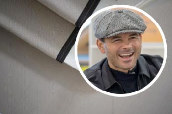 Neutral herringbone wool carpet stair runner with black edging